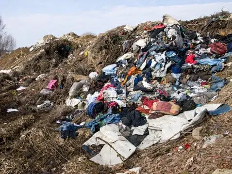 A large number of clothes are dumped openly near the river bank without any proper infrastructure. A large number of clothes are dumped openly near the river bank without any proper infrastructure.